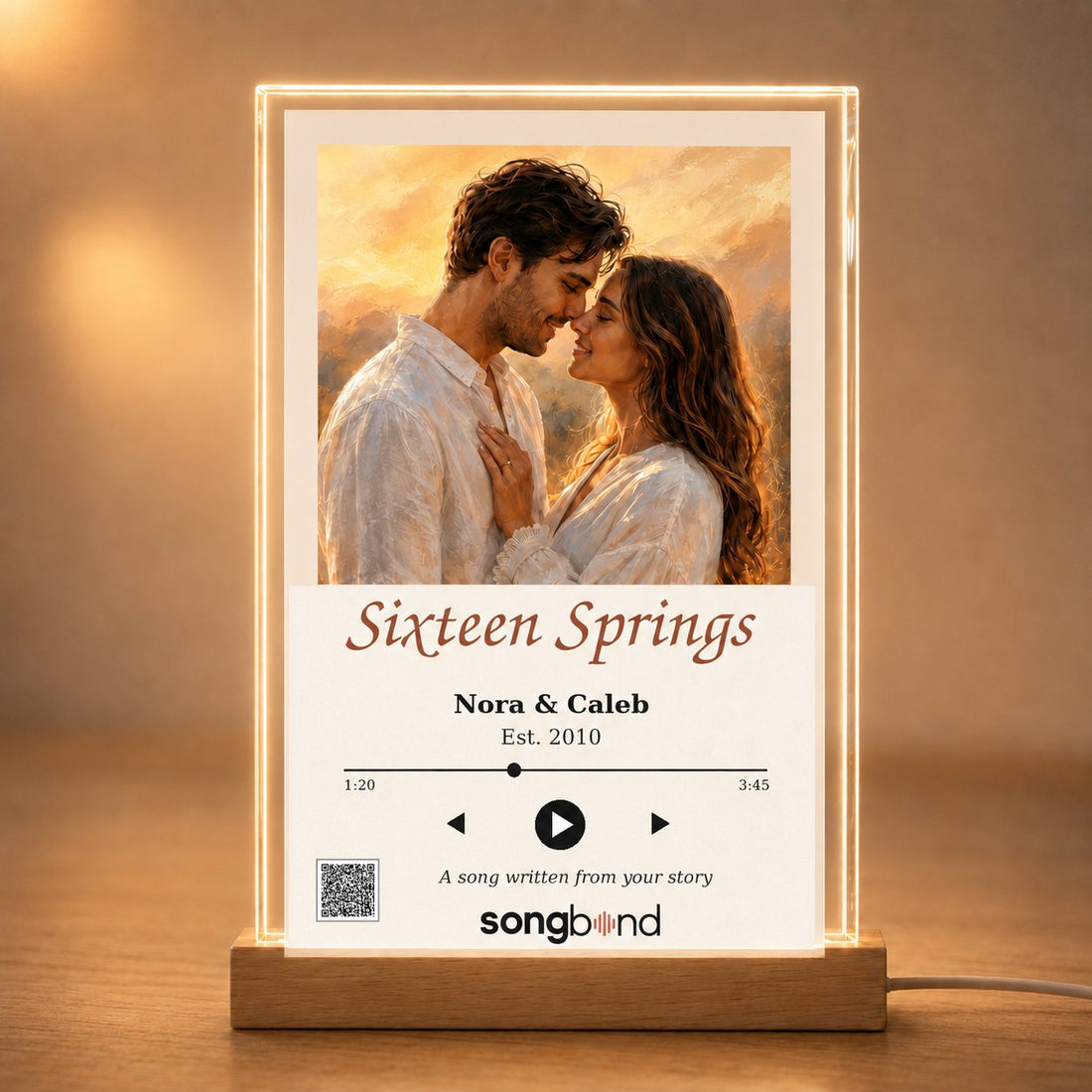 16th anniversary gift — personalized song plaque: lit acrylic couple portrait, Nora & Caleb Est. 2010, QR to song — Songbond