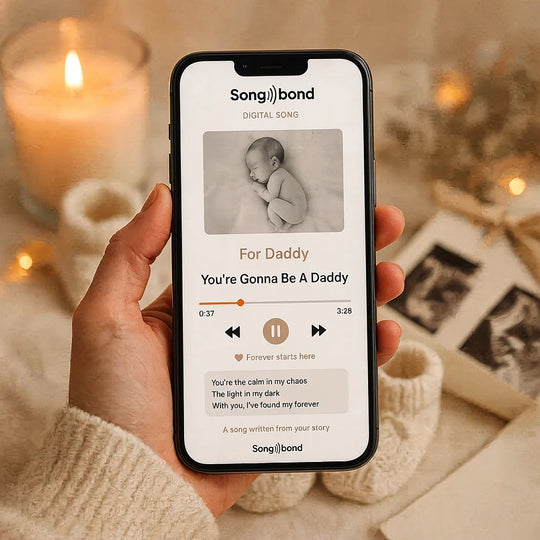 Songbond app playing You're Gonna Be A Daddy — custom pregnancy announcement song with baby booties and ultrasound