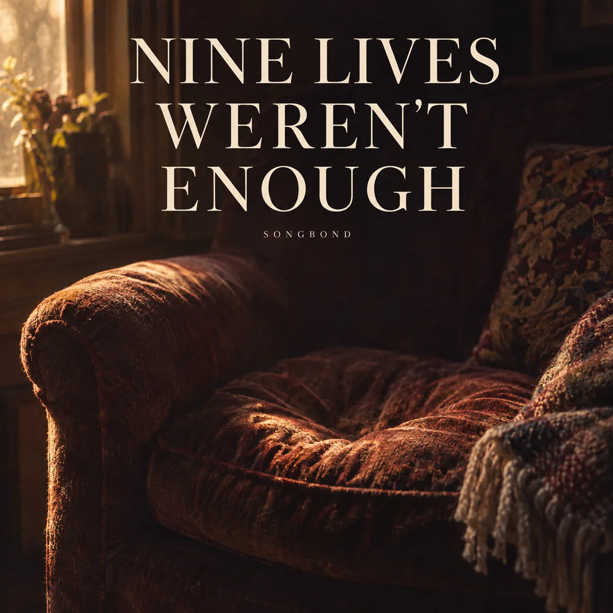 Music cover for Nine Lives Weren't Enough by Songbond, with an empty worn reading chair in warm window light beneath large cream title lettering.
