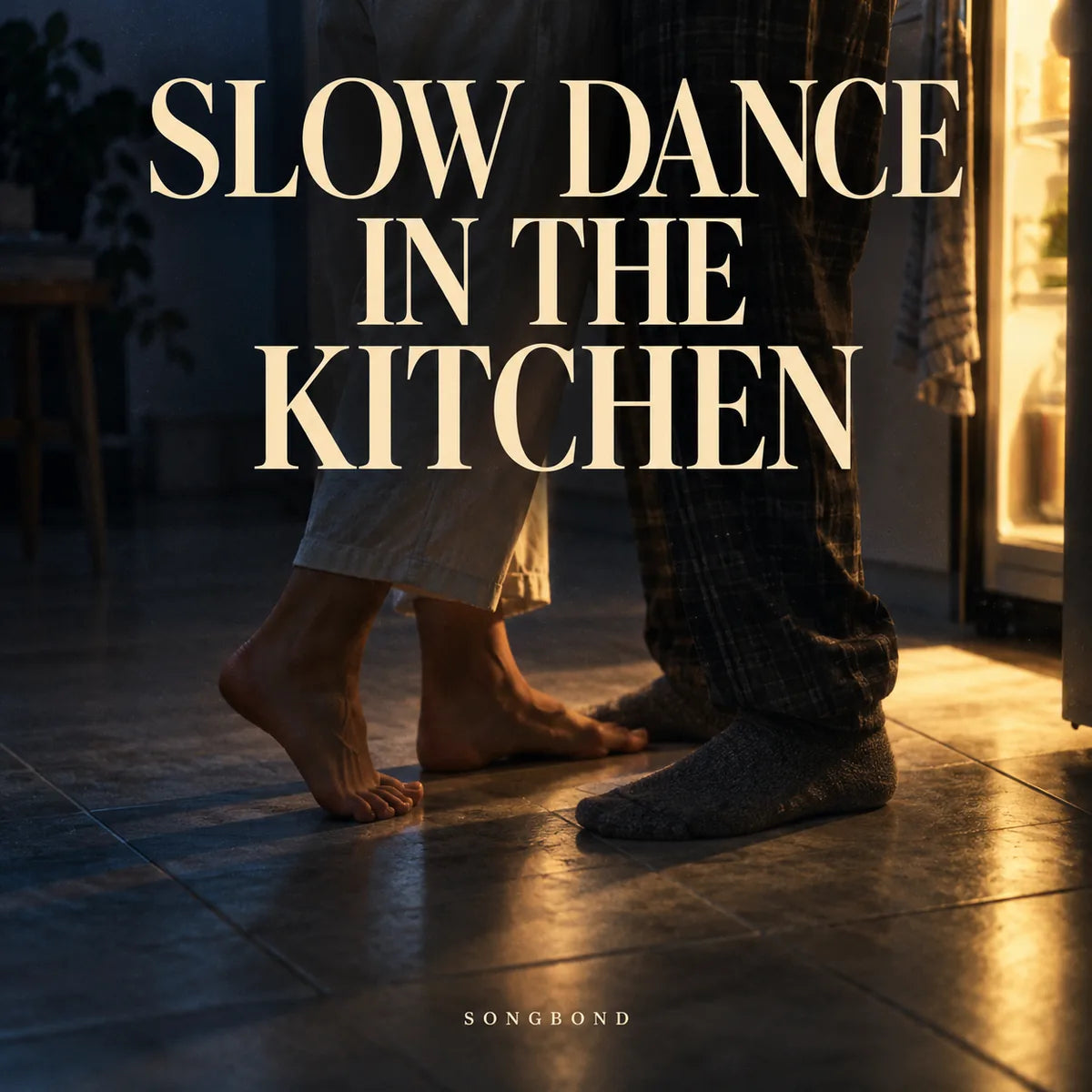 Music cover for Slow Dance in the Kitchen by Songbond, with two adults' bare and socked feet on kitchen tile in a warm refrigerator-light glow under cream lettering.